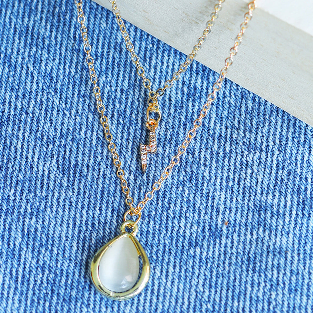 Contemporary Diamante Studded Lightning & Moonstone Teardrop Pendant Gold-Toned Multi-Layered Necklace