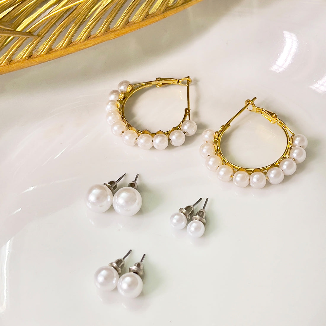 Set Of 4 Pearl Studs In Different Sizes & Gold-Toned Pearl Studded Hoop Earrings