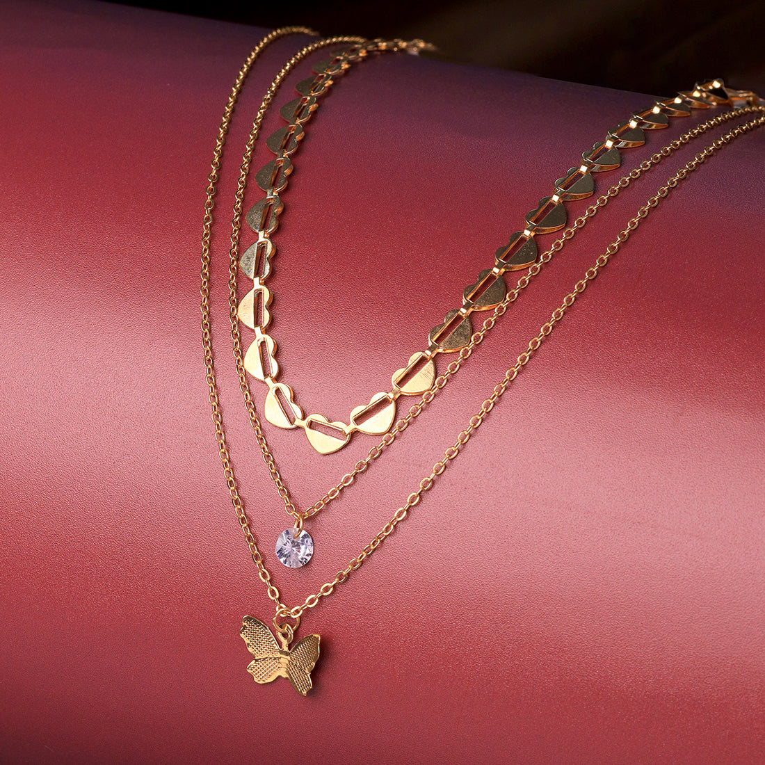 Trendy Three Layered Gold Necklace with Butterfly Pendant , diamonti stone and Chain of Hearts