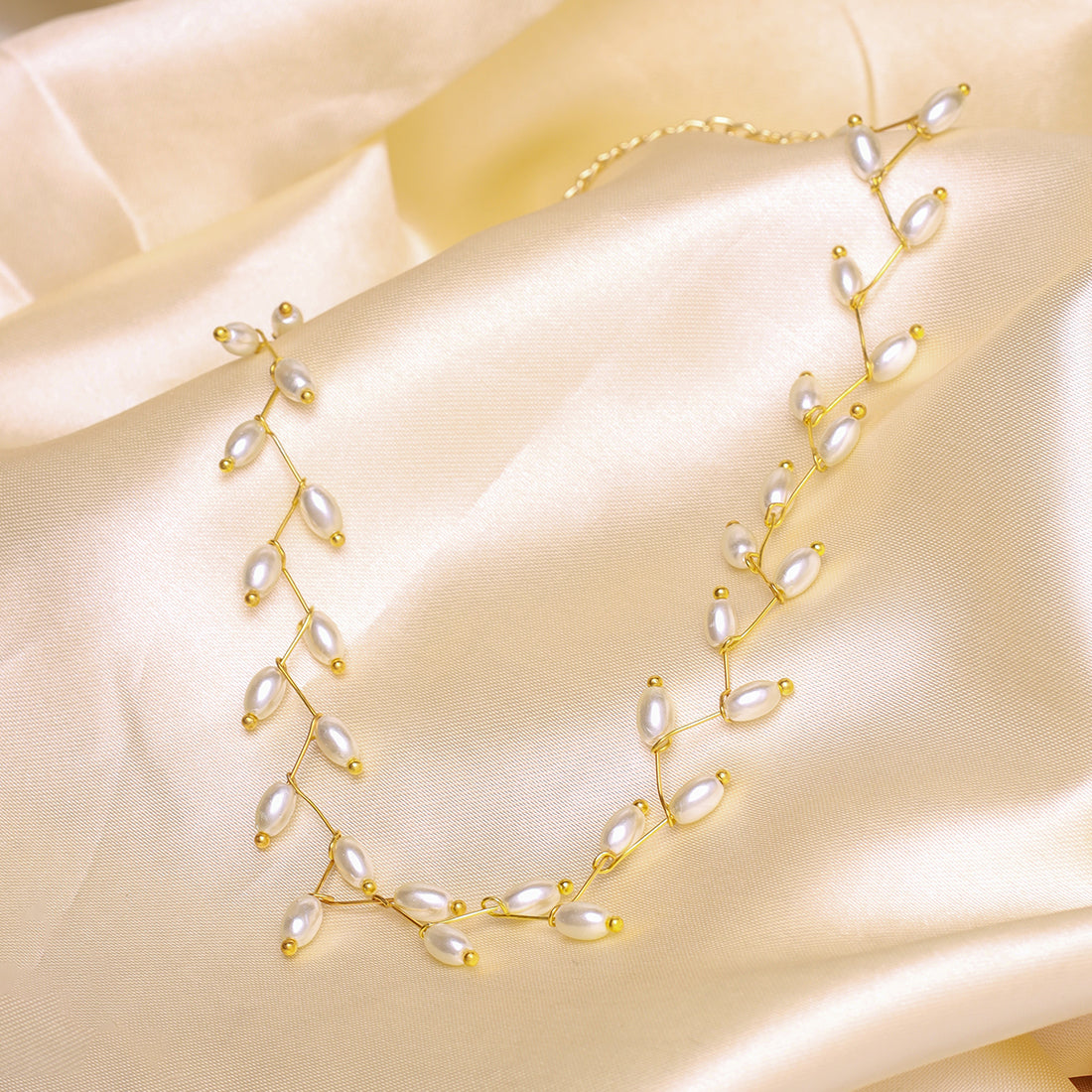 Gold-Tone Choker Necklace With Oval Pearls Arranged In A Leaf Pattern