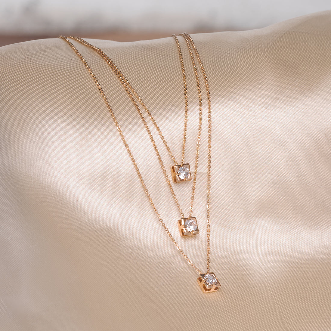 Gold Cube Necklace With Central Diamond