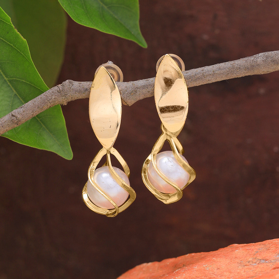 Sophisticated Gold-Toned Earrings With A Single, Elegant Pearl Drop.