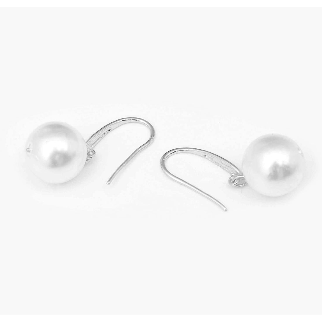 Minimalist Silver Earrings Featuring A Striking, Large Pearl.